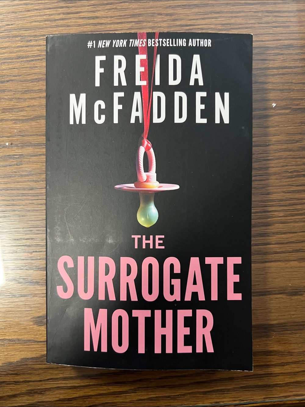 Freida McFadden "The Surrogate Mother" Paperback - Black & Pink Cover
